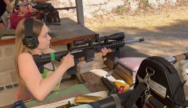 Member using a scoped rifle at the covered range — enlarge photo